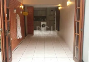 Foto 1 de Casa de Condomínio com 3 Quartos à venda, 118m² em Medianeira, Porto Alegre