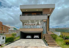 Foto 1 de Casa de Condomínio com 3 Quartos à venda, 300m² em Alphaville, Gravataí