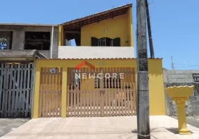 Foto 1 de Sobrado com 3 Quartos à venda, 109m² em Balneário Europa, Mongaguá