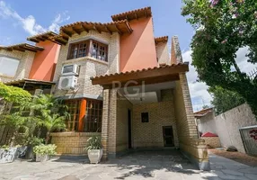 Foto 1 de Casa com 3 Quartos à venda, 146m² em Guarujá, Porto Alegre