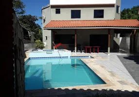 Foto 1 de Casa de Condomínio com 5 Quartos à venda, 230m² em Loteamento Costa do Sol, Bertioga