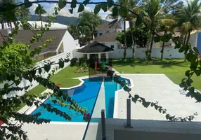 Foto 1 de Casa de Condomínio com 6 Quartos à venda, 680m² em Jardim Acapulco , Guarujá