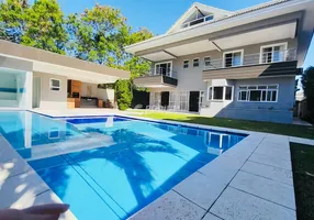 Foto 1 de Casa de Condomínio com 4 Quartos à venda, 545m² em Barra da Tijuca, Rio de Janeiro