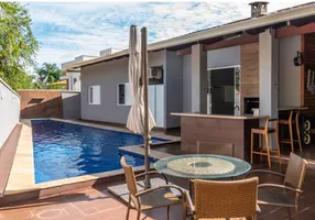 Foto 1 de Casa de Condomínio com 4 Quartos à venda, 355m² em Loteamento Portal do Sol I, Goiânia