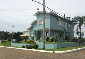 Foto 1 de Casa de Condomínio com 5 Quartos à venda, 262m² em Condomínio Condado de Castella, Viamão