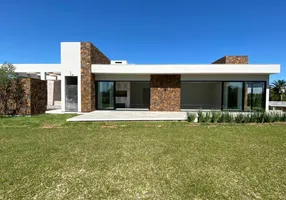 Foto 1 de Casa com 4 Quartos à venda, 186m² em Itapeva, Torres