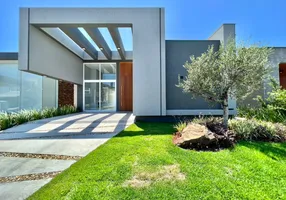 Foto 1 de Casa de Condomínio com 4 Quartos à venda, 180m² em Santa Luzia, Capão da Canoa