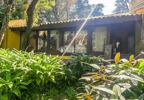 Foto 1 de Casa com 7 Quartos à venda, 600m² em Espiríto Santo, Porto Alegre