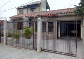 Foto 1 de Casa com 2 Quartos à venda, 142m² em Vila Nova, Porto Alegre