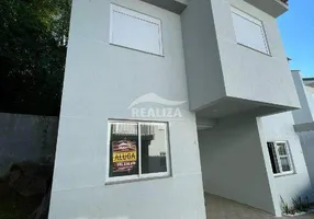 Foto 1 de Sobrado com 3 Quartos à venda, 55m² em Tarumã, Viamão