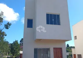 Foto 1 de Casa com 2 Quartos à venda, 60m² em Tarumã, Viamão