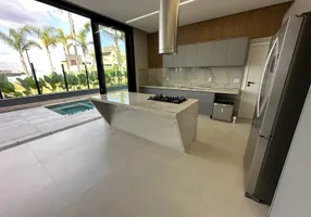 Foto 1 de Casa de Condomínio com 4 Quartos à venda, 308m² em Jardins Italia, Goiânia