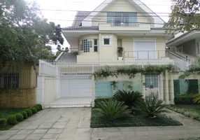 Foto 1 de Casa com 4 Quartos à venda, 303m² em Hugo Lange, Curitiba