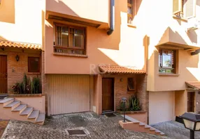 Foto 1 de Casa de Condomínio com 3 Quartos à venda, 150m² em Espiríto Santo, Porto Alegre
