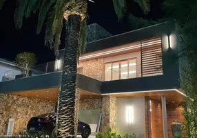 Foto 1 de Casa de Condomínio com 3 Quartos à venda, 400m² em Coaçu, Fortaleza
