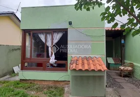 Foto 1 de Casa com 3 Quartos à venda, 61m² em Porto Verde, Alvorada