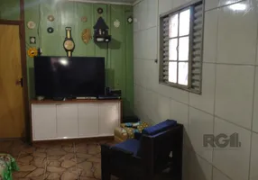 Foto 1 de Casa com 3 Quartos à venda, 69m² em Camaquã, Porto Alegre