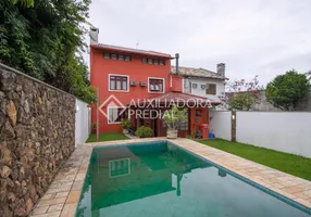 Foto 1 de Casa com 3 Quartos à venda, 250m² em Espiríto Santo, Porto Alegre