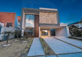 Foto 1 de Casa de Condomínio com 5 Quartos à venda, 378m² em Coacu, Eusébio