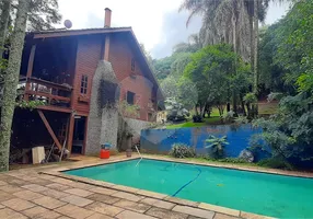 Foto 1 de Casa de Condomínio com 4 Quartos à venda, 280m² em Serra da Cantareira, Mairiporã