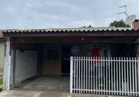 Foto 1 de Casa com 2 Quartos à venda, 42m² em Estados, Fazenda Rio Grande