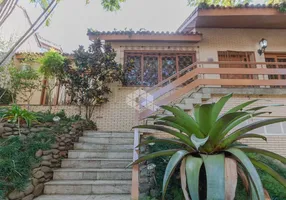 Foto 1 de Casa com 5 Quartos à venda, 270m² em Boa Vista, Porto Alegre