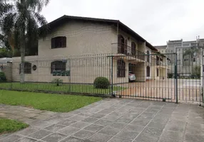 Foto 1 de Sobrado com 4 Quartos à venda, 198m² em Bacacheri, Curitiba