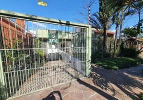 Foto 1 de Casa com 5 Quartos à venda, 247m² em Três Figueiras, Porto Alegre