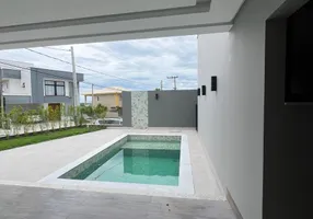 Foto 1 de Casa de Condomínio com 4 Quartos à venda, 221m² em Lagoa, Macaé