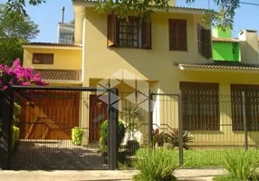Foto 1 de Casa com 4 Quartos à venda, 246m² em Santa Fé, Porto Alegre