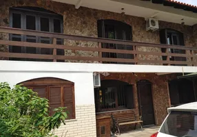 Foto 1 de Casa com 5 Quartos à venda, 330m² em Cavalhada, Porto Alegre