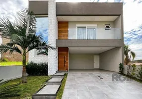 Foto 1 de Casa de Condomínio com 3 Quartos à venda, 239m² em Alto Petrópolis, Porto Alegre