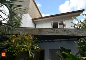 Foto 1 de Casa de Condomínio com 4 Quartos à venda, 317m² em Canto da Lagoa, Florianópolis