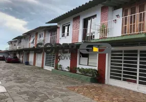 Foto 1 de Casa de Condomínio com 3 Quartos à venda, 88m² em Cristal, Porto Alegre