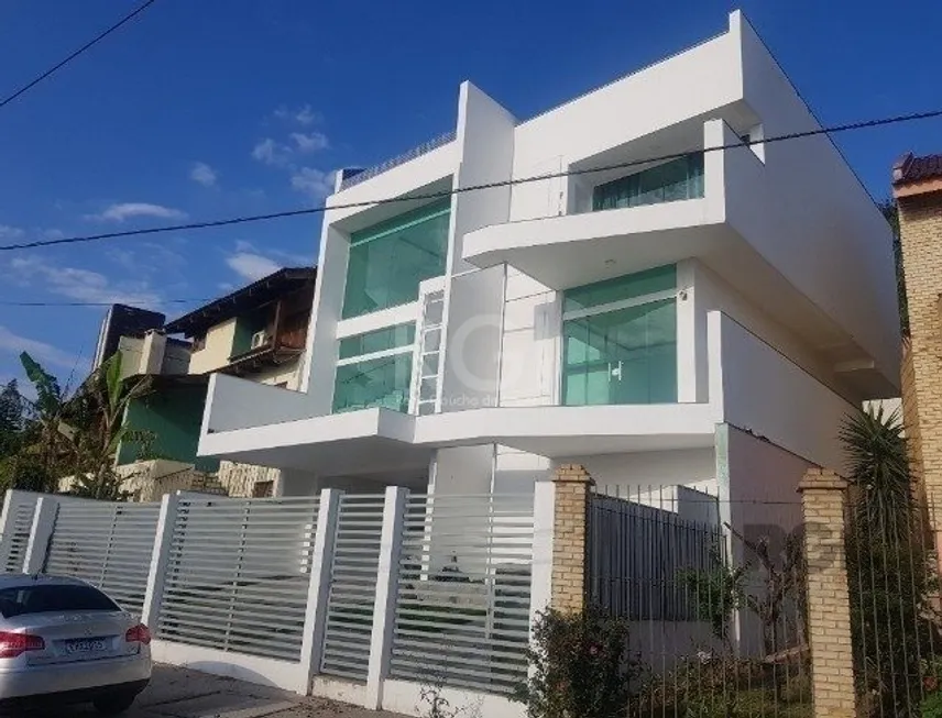 Foto 1 de Casa com 4 Quartos à venda, 299m² em Nonoai, Porto Alegre