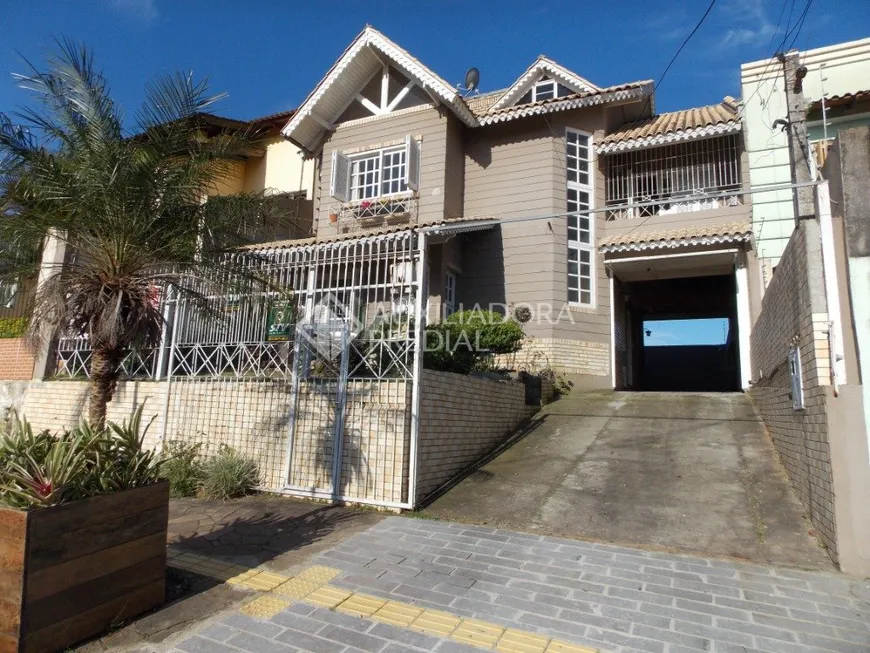 Foto 1 de Casa com 4 Quartos à venda, 180m² em Estância Velha, Canoas