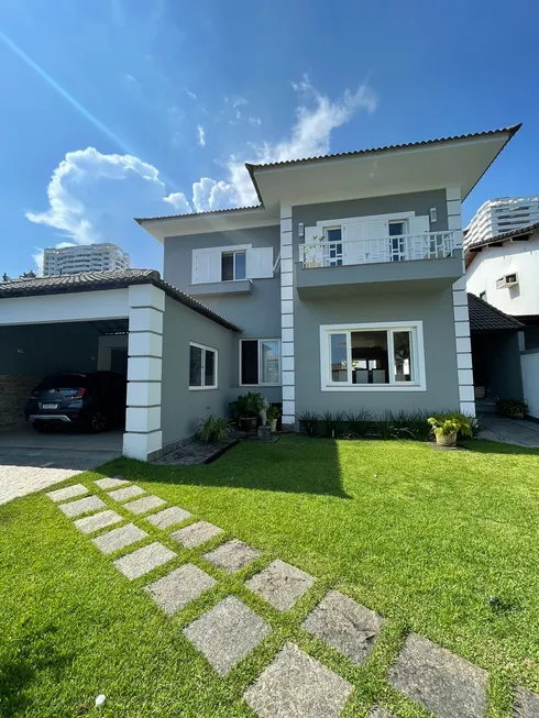 Foto 1 de Casa de Condomínio com 5 Quartos à venda, 660m² em Barra da Tijuca, Rio de Janeiro