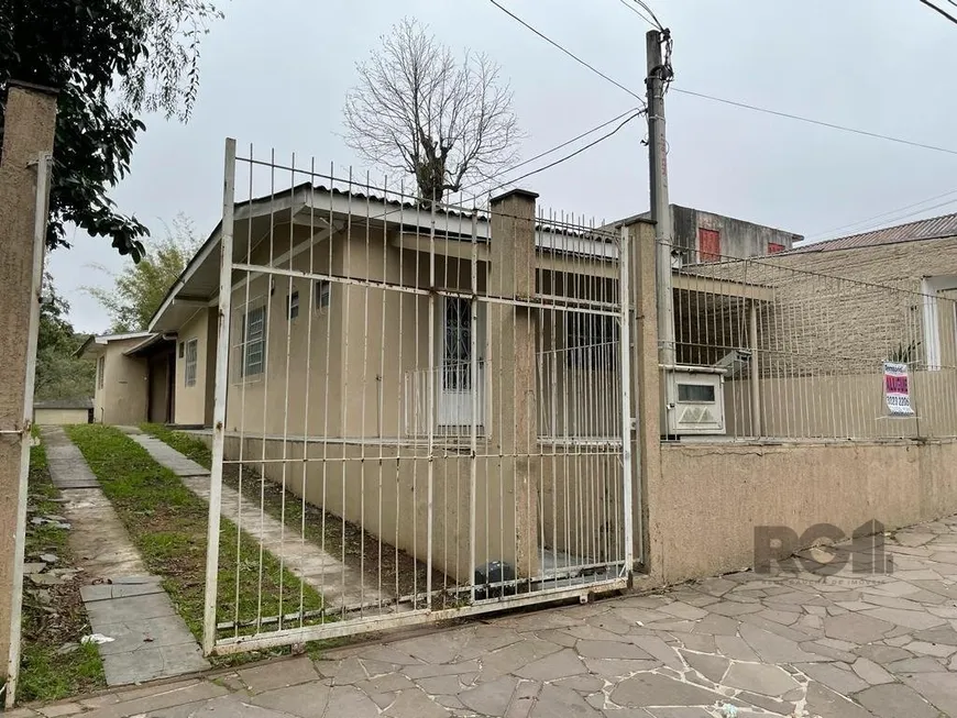 Foto 1 de Casa com 3 Quartos à venda, 150m² em Vila Nova, Porto Alegre