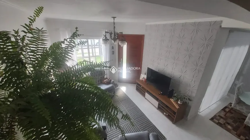 Foto 1 de Casa com 3 Quartos à venda, 104m² em Hípica, Porto Alegre