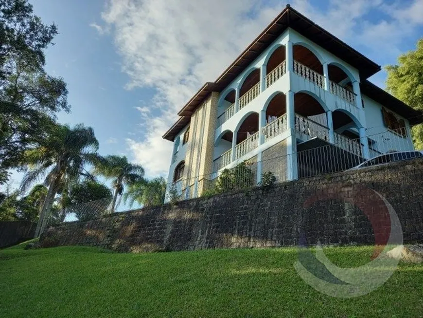 Foto 1 de Casa com 6 Quartos à venda, 353m² em Itacorubi, Florianópolis
