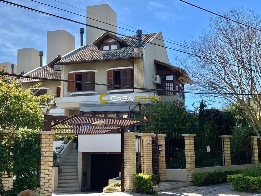 Foto 1 de Casa de Condomínio com 4 Quartos à venda, 318m² em Vila Conceição, Porto Alegre