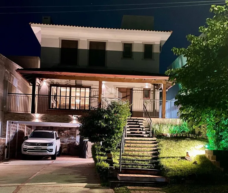 Foto 1 de Casa de Condomínio com 3 Quartos à venda, 250m² em Querência, Viamão