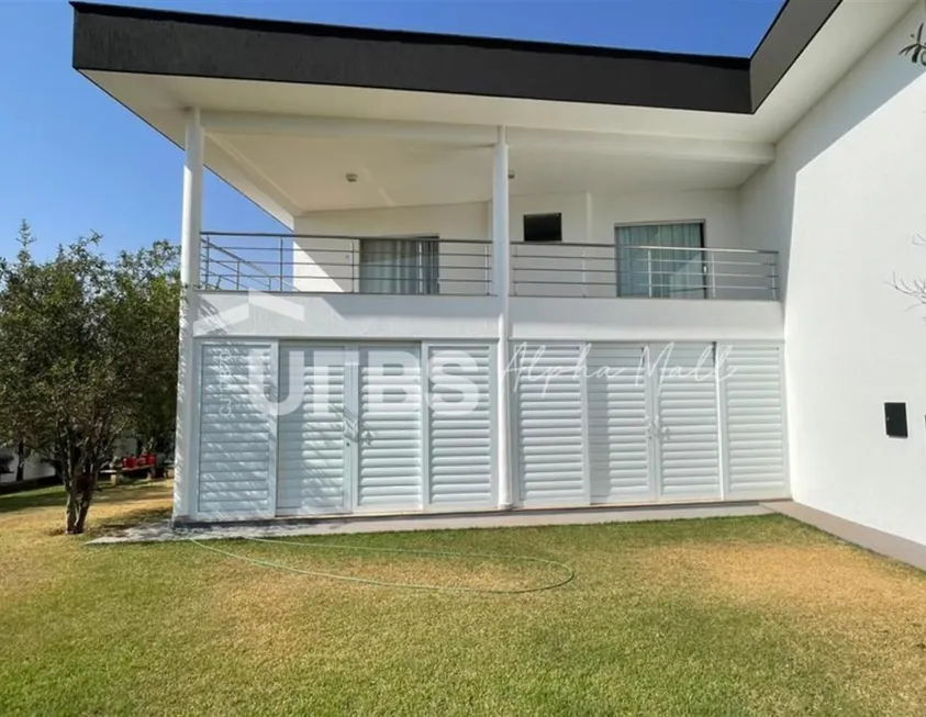 Foto 1 de Casa de Condomínio com 4 Quartos à venda, 425m² em Residencial Alphaville Flamboyant, Goiânia