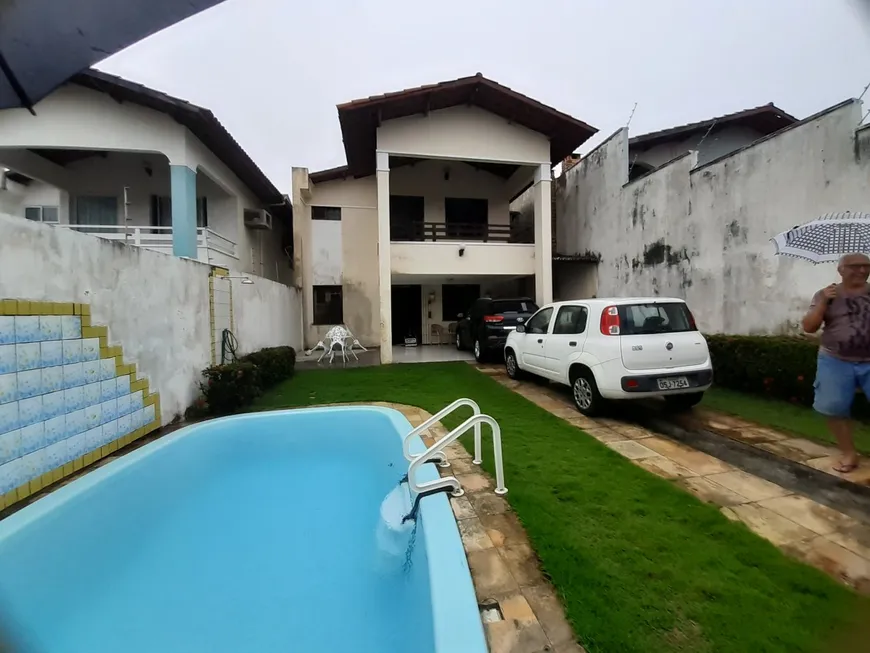 Foto 1 de Casa com 5 Quartos à venda, 200m² em Sapiranga, Fortaleza