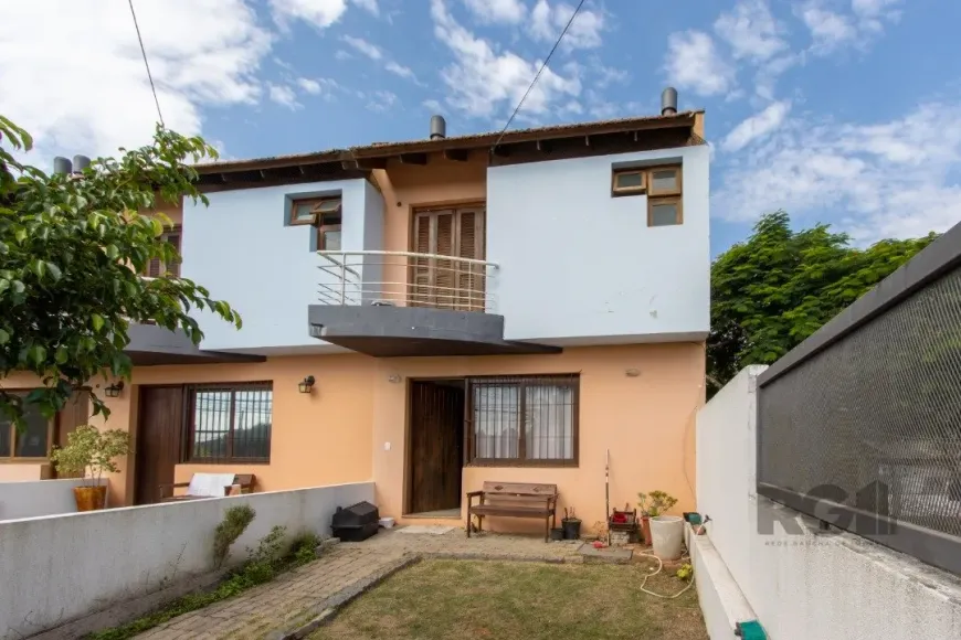 Foto 1 de Casa de Condomínio com 3 Quartos à venda, 99m² em Espiríto Santo, Porto Alegre