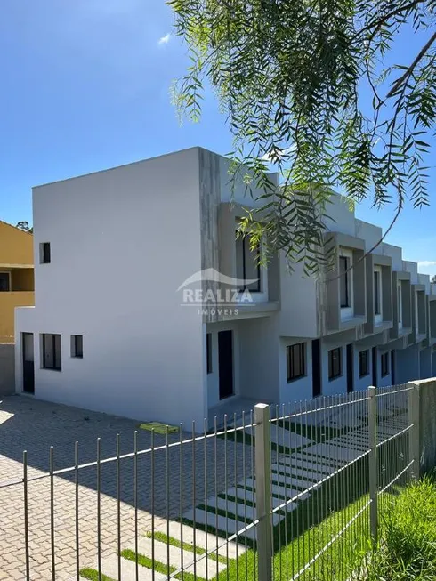 Foto 1 de Sobrado com 2 Quartos à venda, 64m² em Tarumã, Viamão