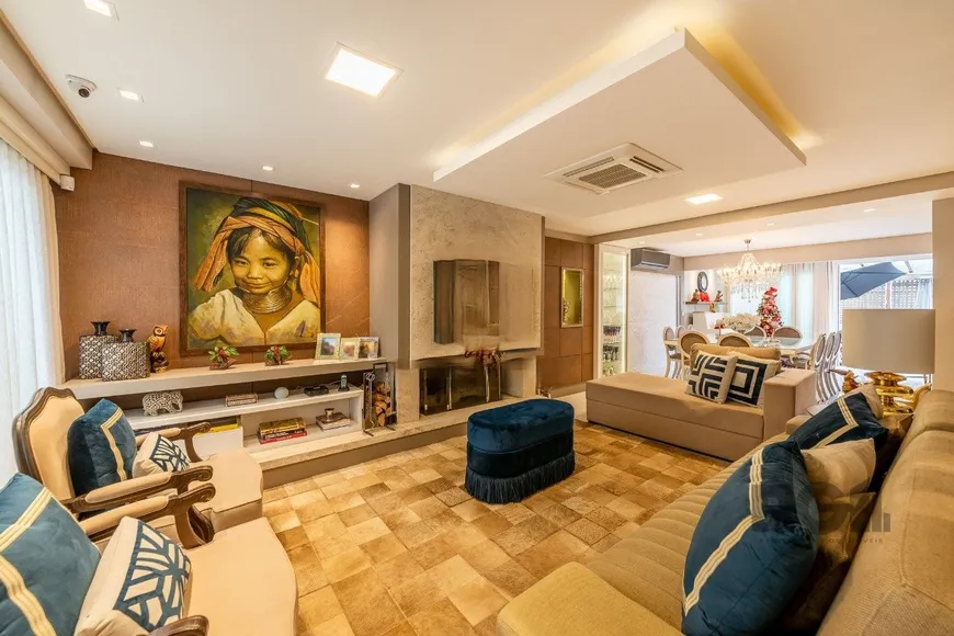 Foto 1 de Casa de Condomínio com 4 Quartos para venda ou aluguel, 324m² em Três Figueiras, Porto Alegre