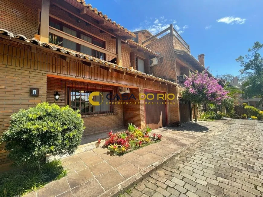 Foto 1 de Casa de Condomínio com 3 Quartos à venda, 202m² em Tristeza, Porto Alegre