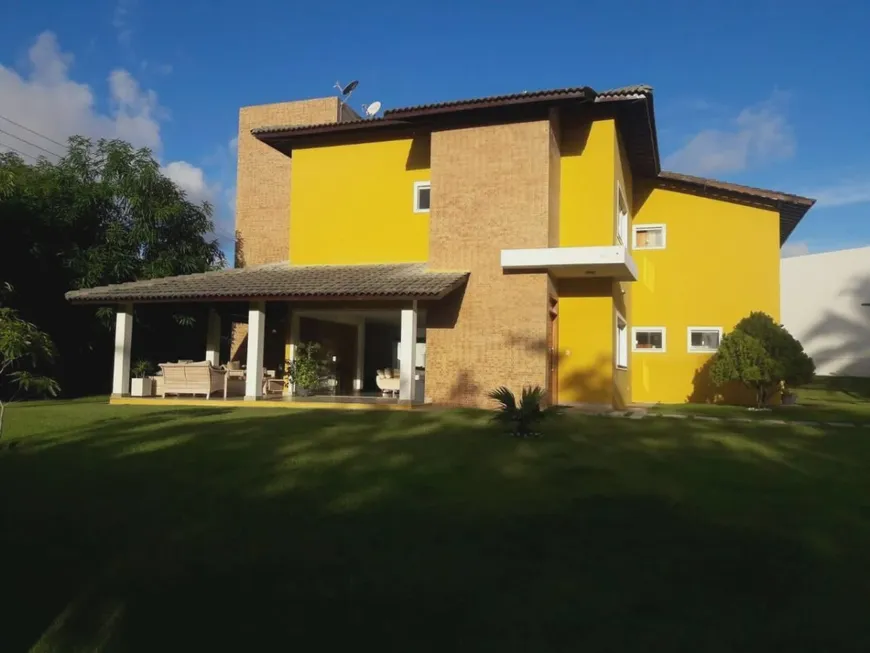 Foto 1 de Casa de Condomínio com 5 Quartos à venda, 550m² em Busca Vida Abrantes, Camaçari