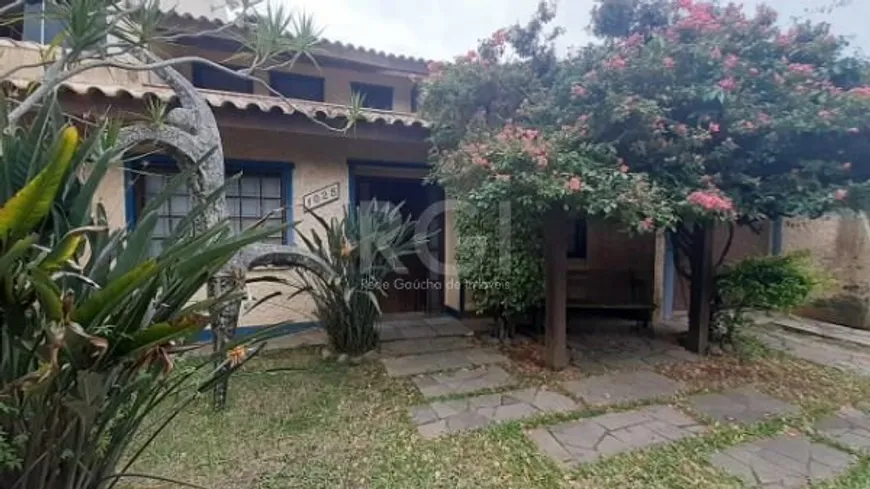 Foto 1 de Casa com 4 Quartos à venda, 339m² em Guarujá, Porto Alegre